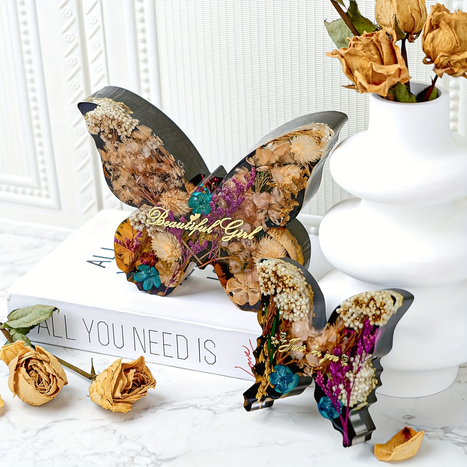 Two sizes of butterfly resin m - مراجعة Flower Preservation Resin وسعره
